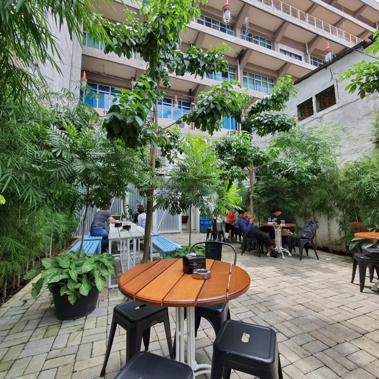 Calling all Medan WFC crew! A secret garden is hidden behind this yellow door.